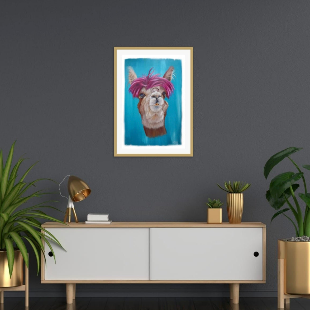 Room mock up showing the bold, modern colours of the Alpaca print in a light wood frame, tying it into the furniture and brightening up a dark wall with a pop of much needed vibrancy.